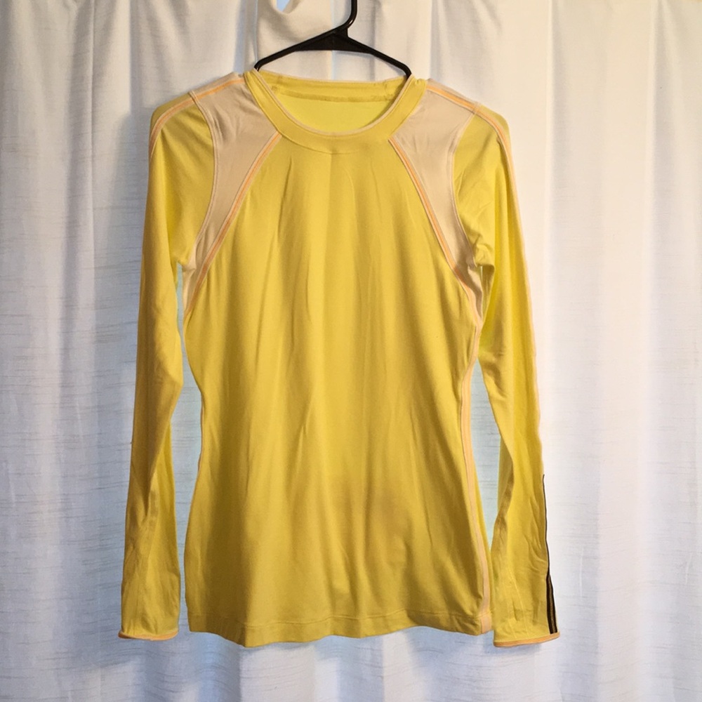 Lululemon long sleeve w/ back pocket size 4